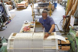 Transformer technician building a new dry type transformer.