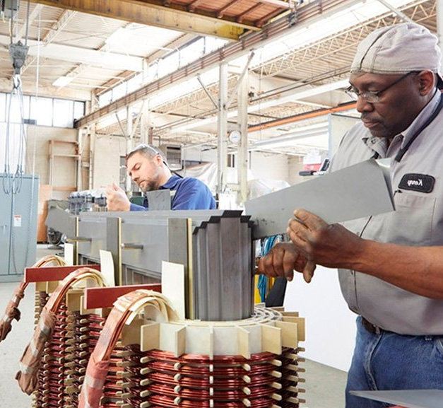 ESLCO Workers building a dry type transformer